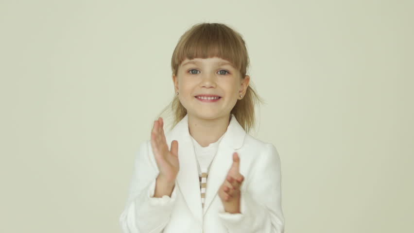 Little girl clapping her hands
