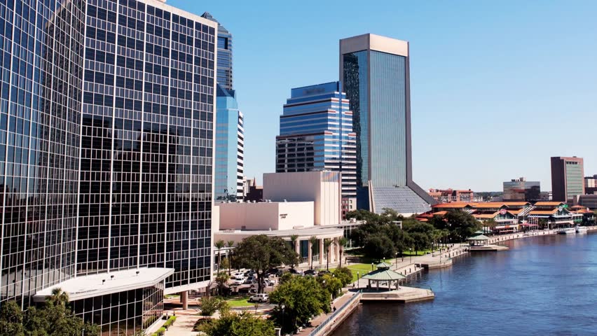 4K hyperlapse footage of Jacksonville, Florida skyline, showing skyscrapers, riverfront bridges, and city streets in dynamic motion. The sequence highlights architectural details, urban planning, and the city’s vibrant environment. Ideal for editorial use in journalism, cityscape storytelling, travel features, metropolitan development content, and visual articles covering urban growth, city life, and infrastructure in Jacksonville.Date: 12 October 2024
Location: Jacksonville, Florida, USA

Hyperlapse footage of the Jacksonville, Florida skyline, capturing the city’s modern skyscrapers, bridges, and waterfront areas. The fast-motion sequence emphasizes urban growth, architecture, and city activity. Suitable for editorial use in news stories, urban development features, travel journalism, and articles about Jacksonville’s infrastructure, economy, and metropolitan lifestyle.