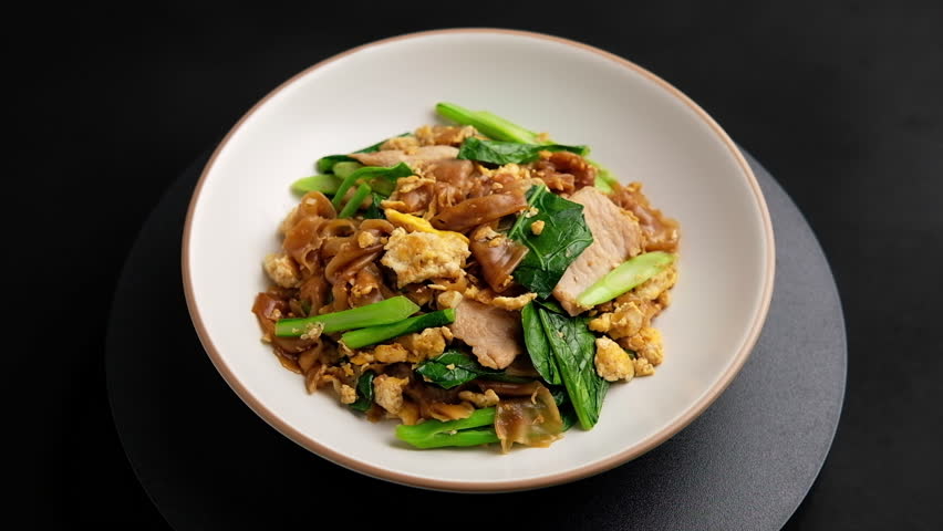 Stir fried Rice Noodles(flat noodle) with Soy Sauce egg and Pork,Pad See Ew