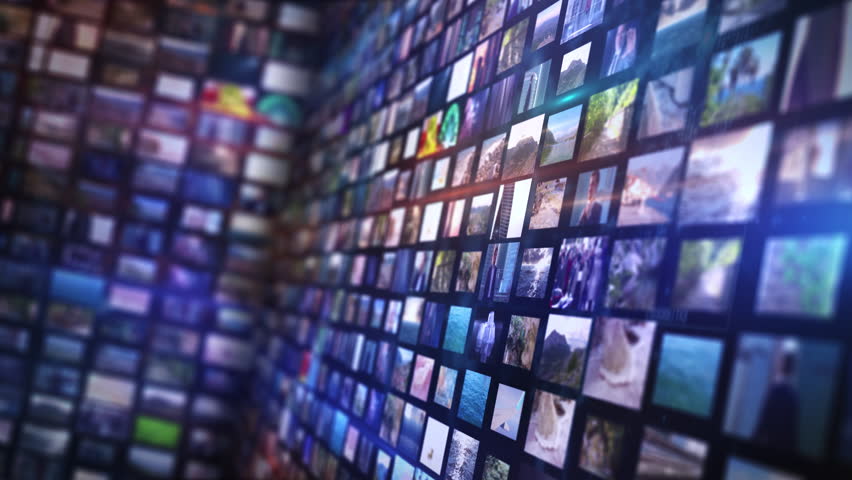Media wall showing multiple streaming video screens with various digital content