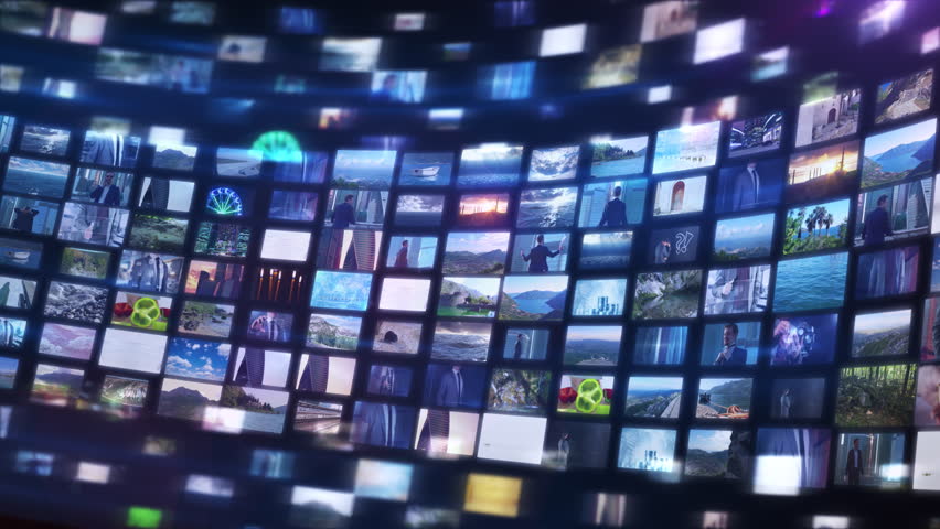 Abstract technology background with multiple screens displaying various videos and data