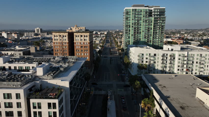 Long Beach, California, USA - Aerial View of Long Beach Blvd and Broadway in Downtown Along With the Train and Buildings