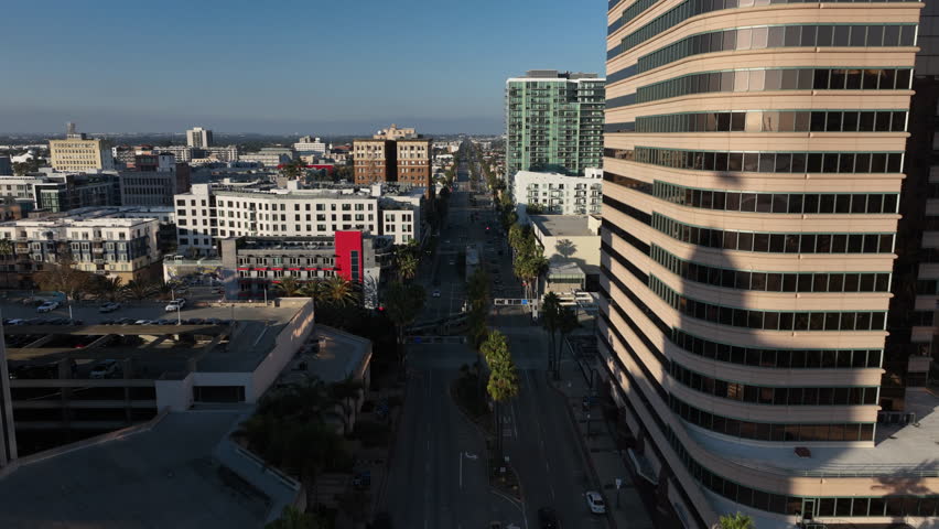 Long Beach, California, USA - Aerial View of Long Beach Blvd in Downtown Along With the Train and Buildings