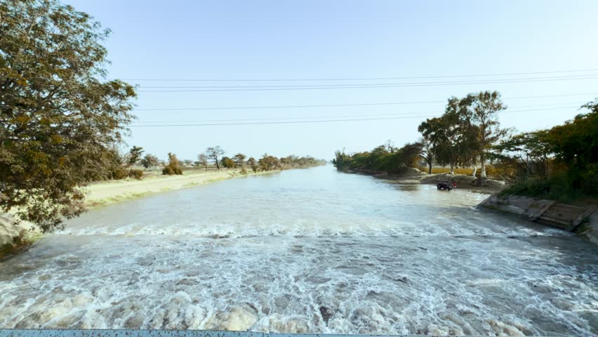  Rapid White Water Cascading Over a Concrete Spillway in a Rural Irrigation Canal