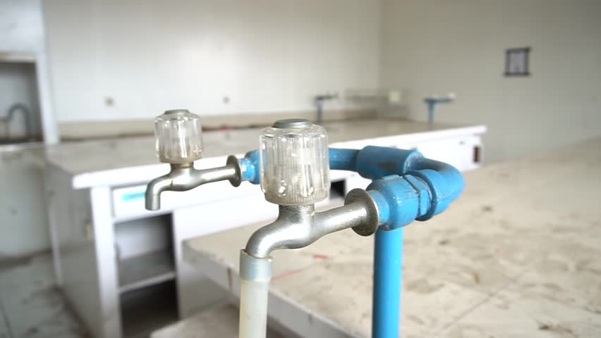 Abandoned Old Building with Broken Windows and Decaying Walls