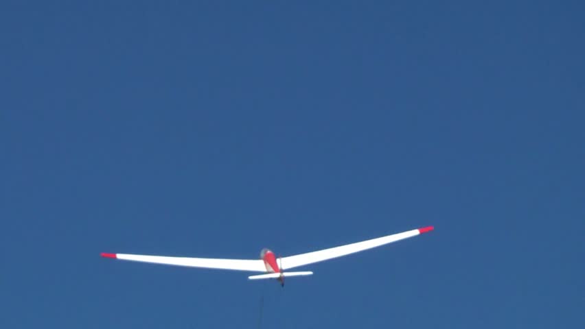 Glider against a blue sky