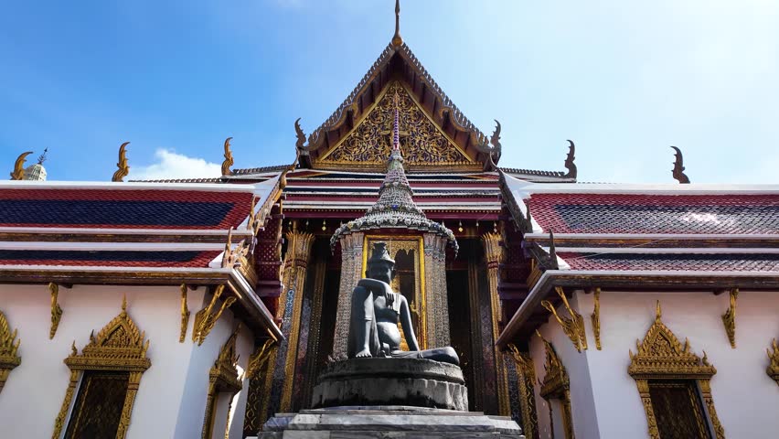 Bangkok temple with statue, cultural heritage, serene atmosphere