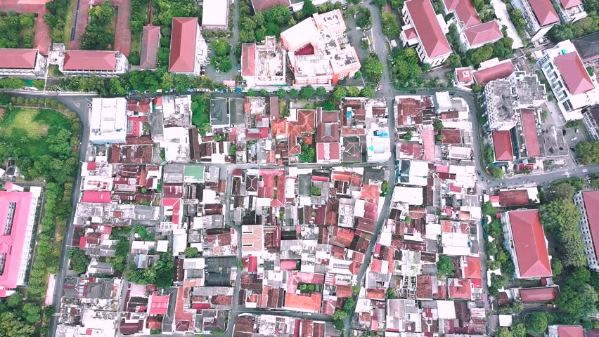 Top Down Aerial Drone Footage of Dense Urban Neighborhood with Residential Buildings and Streets