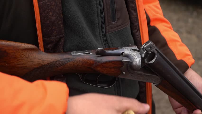 Hunting preparation in Lestane Serbia as enthusiasts handle their firearms for the upcoming season