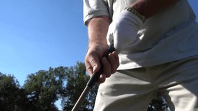 Senior businessman with white beard playing golf, showcasing leisure, sports, active lifestyle, and outdoor recreation for mature adults. - Powered by Shutterstock - Get 15% off with code: PIKWIZARD15