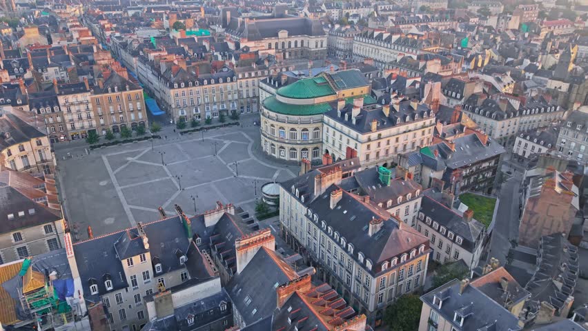Aerial of Rennes Opera House with historic city center and Brittany Parliament nearby, establishing dolly