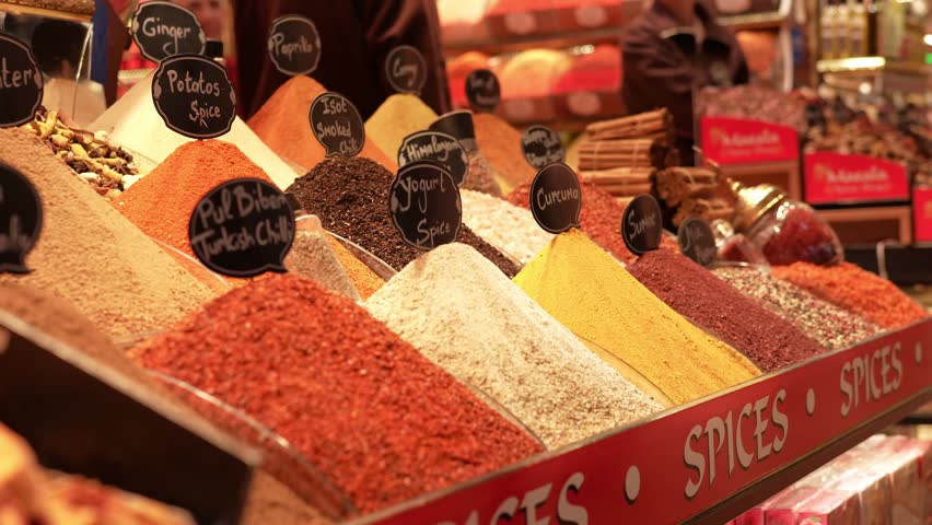 Various oriental spices and seasonings displayed for sale at a traditional market stall in istanbul