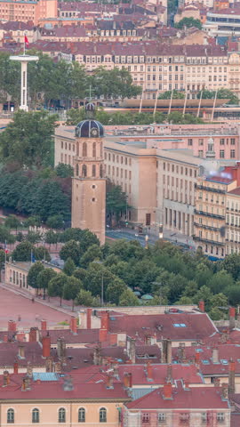 Aerial timelapse of Place Bellecour from Fourviere Hill in Lyon, France, the largest pedestrian square in Europe. Featuring the equestrian statue of King Louis XIV surrounded by historic buildings