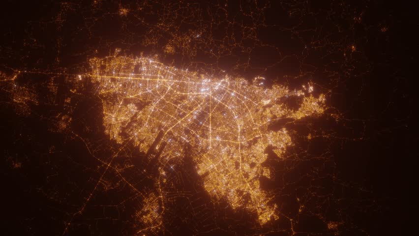 Bogota (Colombia) top view at night. View on modern city from satellite. Camera is zooming in, rotating counterclockwise. Vertical video. The north is on the left side