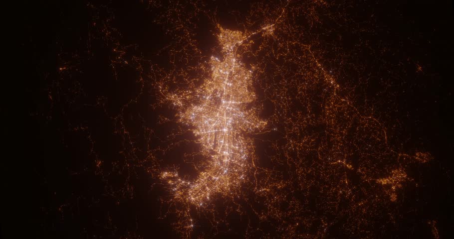 Medellin (Colombia) aerial view at night. View on modern city from space. Camera is zooming in, rotating counterclockwise