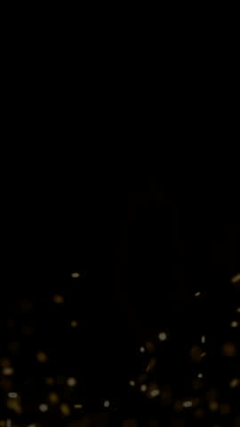 Gold Particles Floating Over Black Background, Gentle Shimmer And Bokeh Highlights Create Luxurious Festive Ambience And Cinematic Sparkle