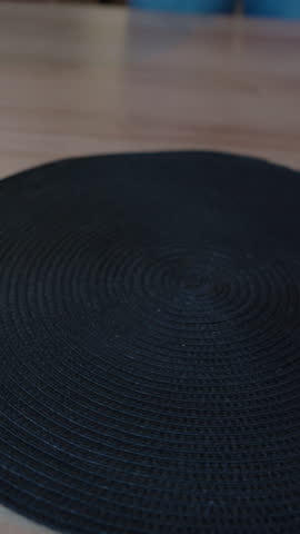 Small slice of layered cake garnished with fresh raspberry on white plate