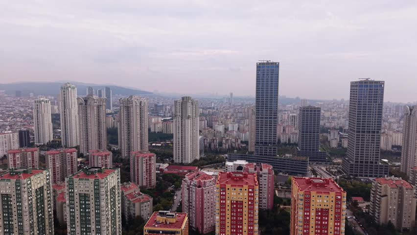 Aerial drone view of modern Istanbul. Panoramic cityscape of Atasehir district, one of the key business and financial centers of the city. High-rise office buildings, major highways, heavy urban traffic and Fenerbahce University. Modern architecture of Turkey’s metropolis, dynamic urban environment, business, education and urban development concepts