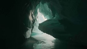 View of a deep blue frozen ice cave inside a glacier in the Alpine mountains. - Powered by Shutterstock - Get 15% off with code: PIKWIZARD15