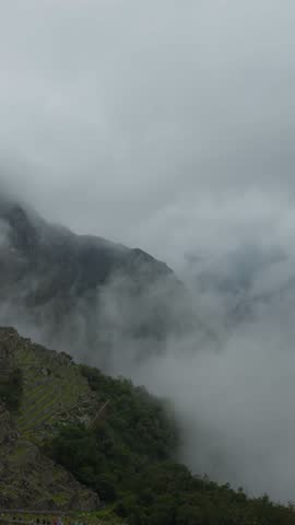 Mist and Clouds Moving Over Machu Picchu Ruins
