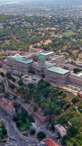 4K aerial vertical video of Buda Castle and Royal Palace in Budapest. Cinematic drone footage of historic Hungarian landmark on Castle Hill. Ideal for travel reels and mobile stories.