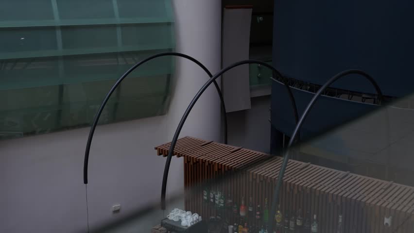 A bride in a white dress holds a wedding bouquet