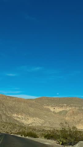Winding Road and Golden Hour Desert Cliffs Along Ross Maxwell Scenic Drive (Big Bend National Park, Texas, USA)