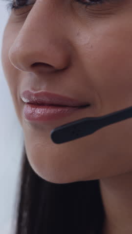 Mouth, call center and mic at office, talk and smile with problem solving for customer service. Person, consultant or agent with voip tech, happy and contact us for solution with headset at company