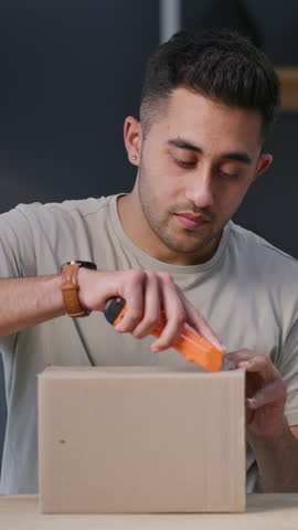 Delivery, unboxing and surprise with man in home for supply chain, ecommerce parcel and distribution, online shopping product, package and shipping with customer in house for courier service