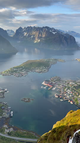 Breathtaking aerial view of the fishing village of Reine in the Lofoten Islands at sunset