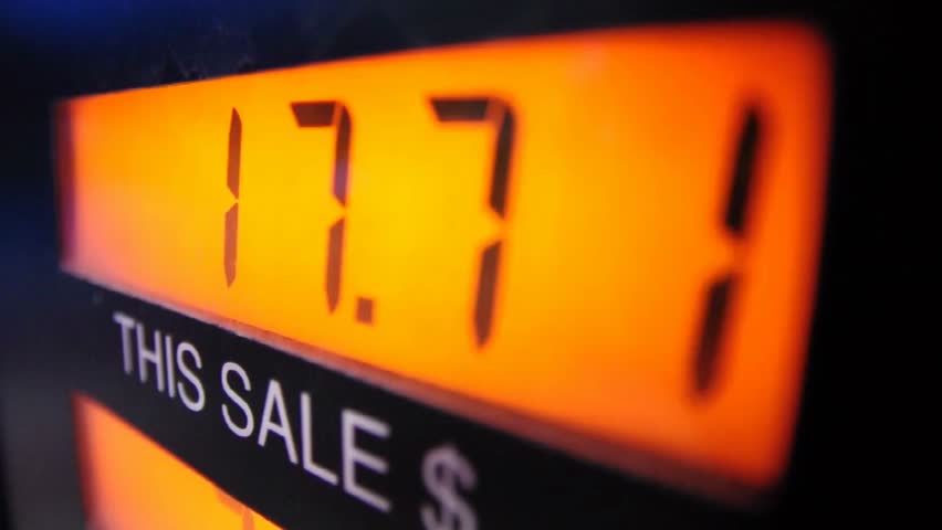 Close-up of a gas pump showing rising fuel prices, highlighting the increasing cost of gasoline, consumer impact, and economic trends in energy.
