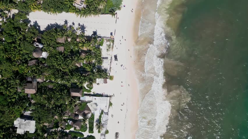 Top View Of People At The White Sand Beaches Of Tulum Resort In Quintana Roo, Mexico. Aerial Orbiting Shot