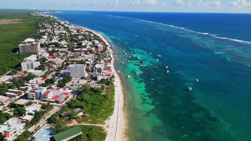 Coastal Port Town Of Puerto Morelos On The Riviera Maya, South Of Cancun In Mexico. Aerial Drone Shot