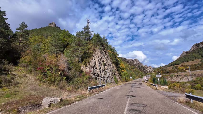 Driving through the Anso Valley, Valles Occidentales Natural Park in the Pyrenees, Aragon, Spain in Europe