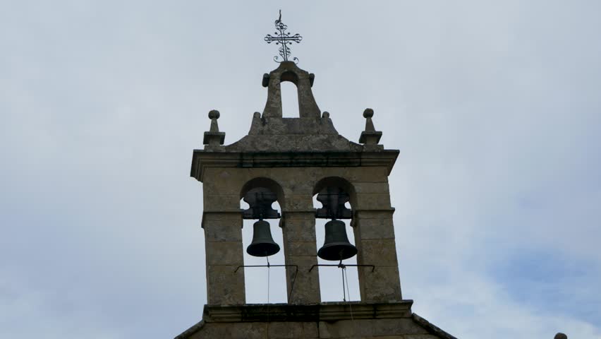 Close-up of a Church Bell Tower with Two Bells 4k