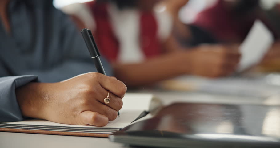 Secretary, hand or writing in notebook for meeting, information record or agenda for discussion points. Essential decision, gathering purpose or person with documentation, taking minutes or details