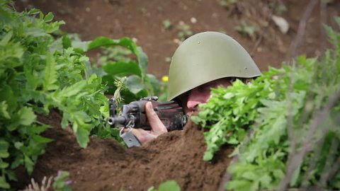 Soldier putting on gas mask Video Stok
