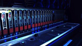 A close-up view of modern server racks in a data center showcasing advanced computing hardware and efficient network management. Ideal for technology-related projects. - Powered by Shutterstock - Get 15% off with code: PIKWIZARD15