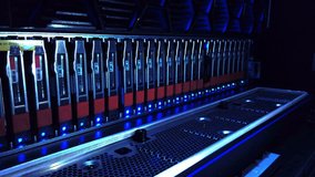A close-up view of modern server racks in a data center showcasing advanced computing hardware and efficient network management. Ideal for technology-related projects. - Powered by Shutterstock - Get 15% off with code: PIKWIZARD15