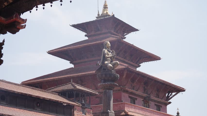 Golden Statue and Pagoda Temple in Kathmandu Durbar Square
