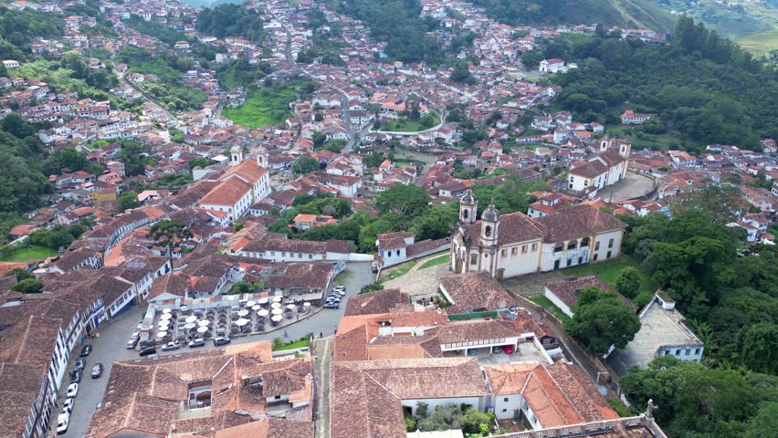 Ouro Preto, Brazil: Aerial view of Church of Saint Francis of Assisi in middle of Ouro Preto old town in the state of Minas Gerais in Brazil. Shot with tilt down motion