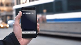 Man in New York City testing 5G download speed on a smartphone as traffic and taxi cabs pass, featuring a fictional speedometer interface. - Powered by Shutterstock - Get 15% off with code: PIKWIZARD15