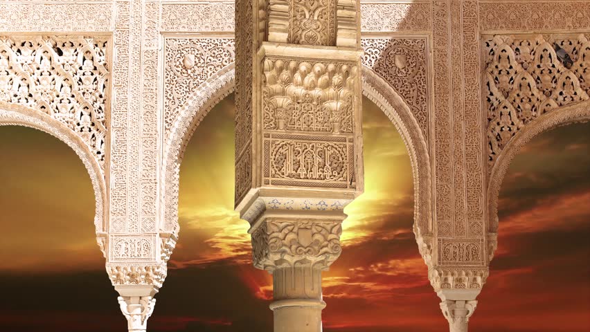 Arches in Islamic (Moorish)  style (against the sunset) in Alhambra, Granada, Spain. 4K, time lapse, with zoom 