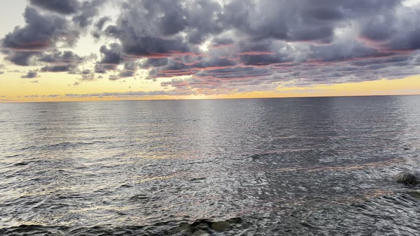 Sunset on lake Michigan on a cloudy day