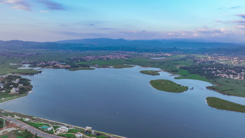 Rural Lake Under Blue Sky And White Clouds Timelapse
