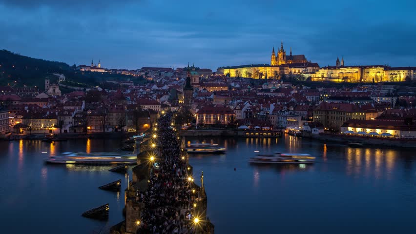Prague Czechia Czech Republic time lapse high angle view day to night city skyline at Charles Bridge