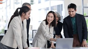 Business team analyzing data on laptop in office meeting. - Powered by Shutterstock - Get 15% off with code: PIKWIZARD15