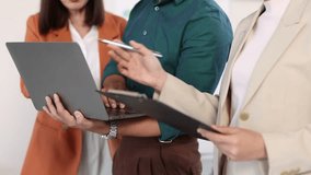 Business team analyzing data on laptop and documents. Asian entrepreneur collaborating, analyzing financial data on a laptop and document, developing strategies for business growth and market success. - Powered by Shutterstock - Get 15% off with code: PIKWIZARD15