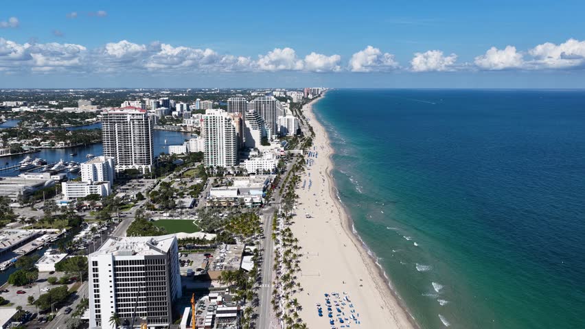 Fort Lauderdale Skyline In Fort Lauderdale Florida United States. Aerial View Of A High-Rise Buildings And Traffic Showcasing Urban Life. Shore Clouds Beach Sea. Outdoors Beach Travel.