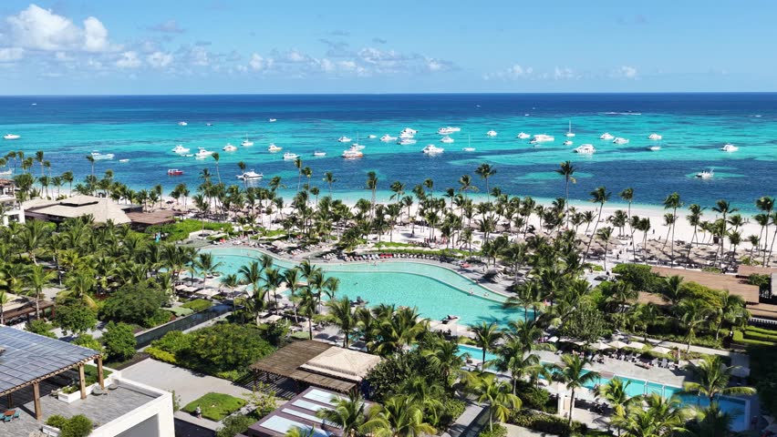 Punta Cana Skyline In Bavaro Punta Cana Dominican Republic. Turquoise Ocean Waves Gently Crashing On Tropical Beach. Shore Sky Beach Sea. Remote Location Beach Tropical Environment.